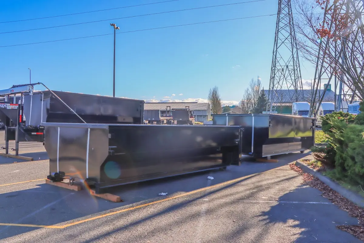 Roll-off dumpster ready for waste disposal at job site for 15 Yard Dumpster Rental in Wareham